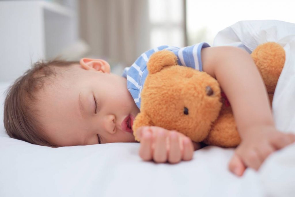 child sleeping on the bed foods to avoid 