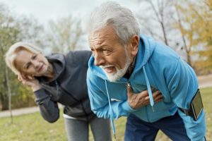 an elderly exercising and start having chest pain heart disease