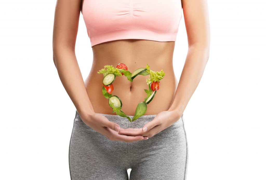 an image of tummy with vegetables for the blog post of how gut health affects your whole body 